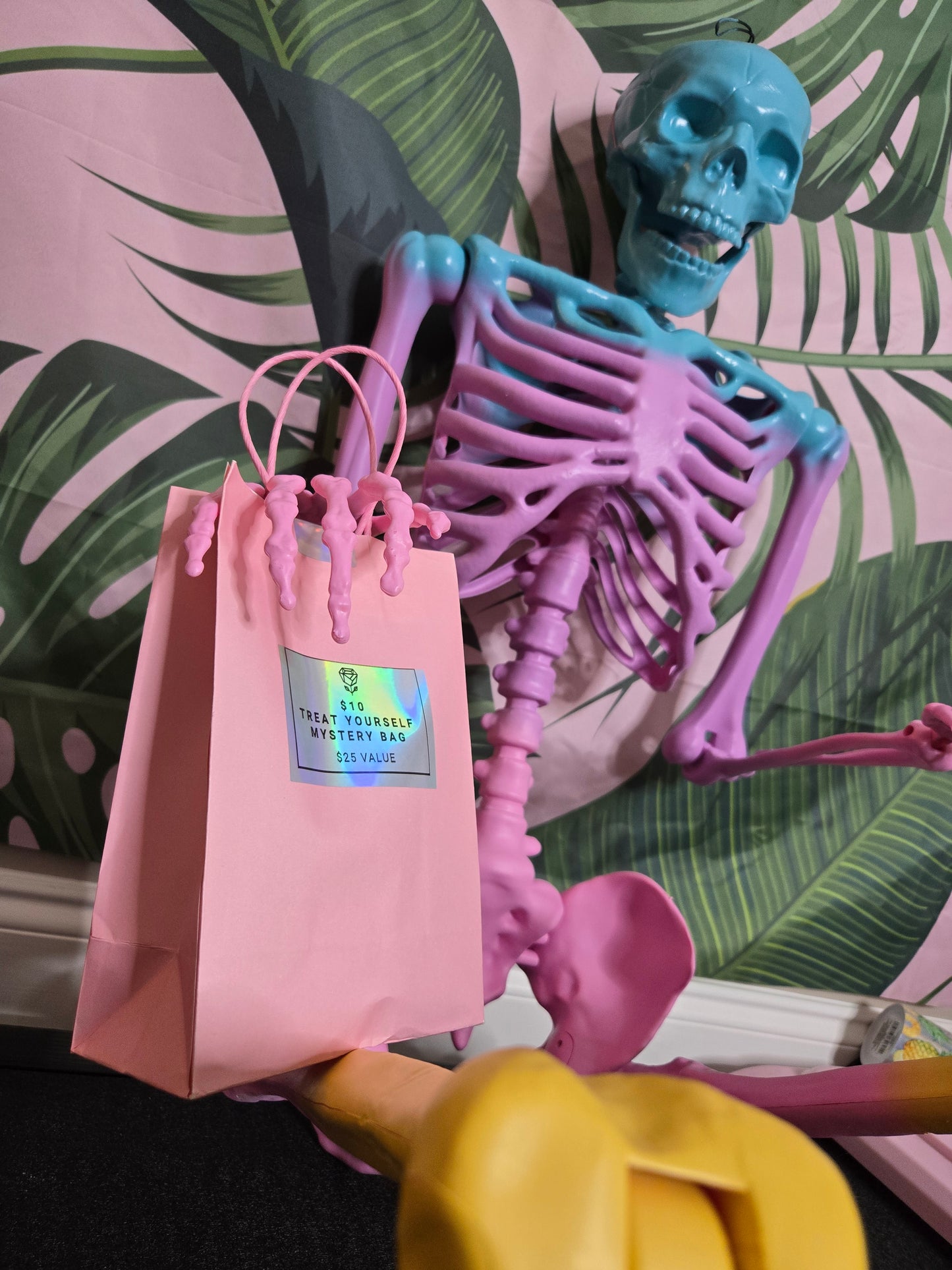 $10 TREAT YOURSELF MYSTERY BAG • $25 VALUE