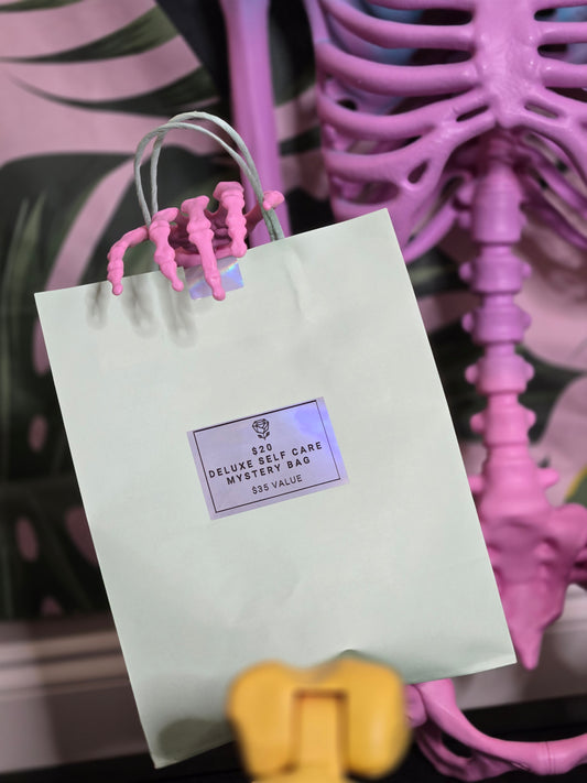 $20 DELUXE SELF-CARE MYSTERY BAG • $35 VALUE
