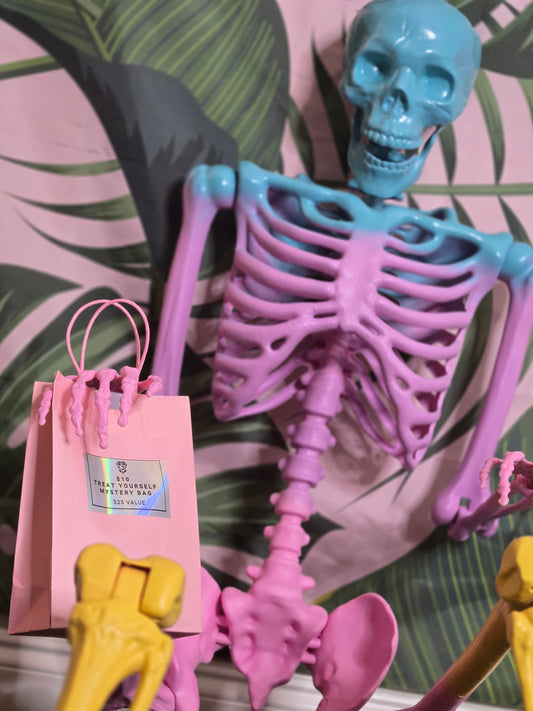 $10 TREAT YOURSELF MYSTERY BAG • $25 VALUE